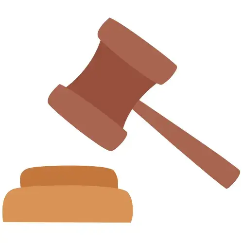 Ein Richterhammer mit Block als Symbol für ein Gesetz zur Bestrafung von Cybermobbing.